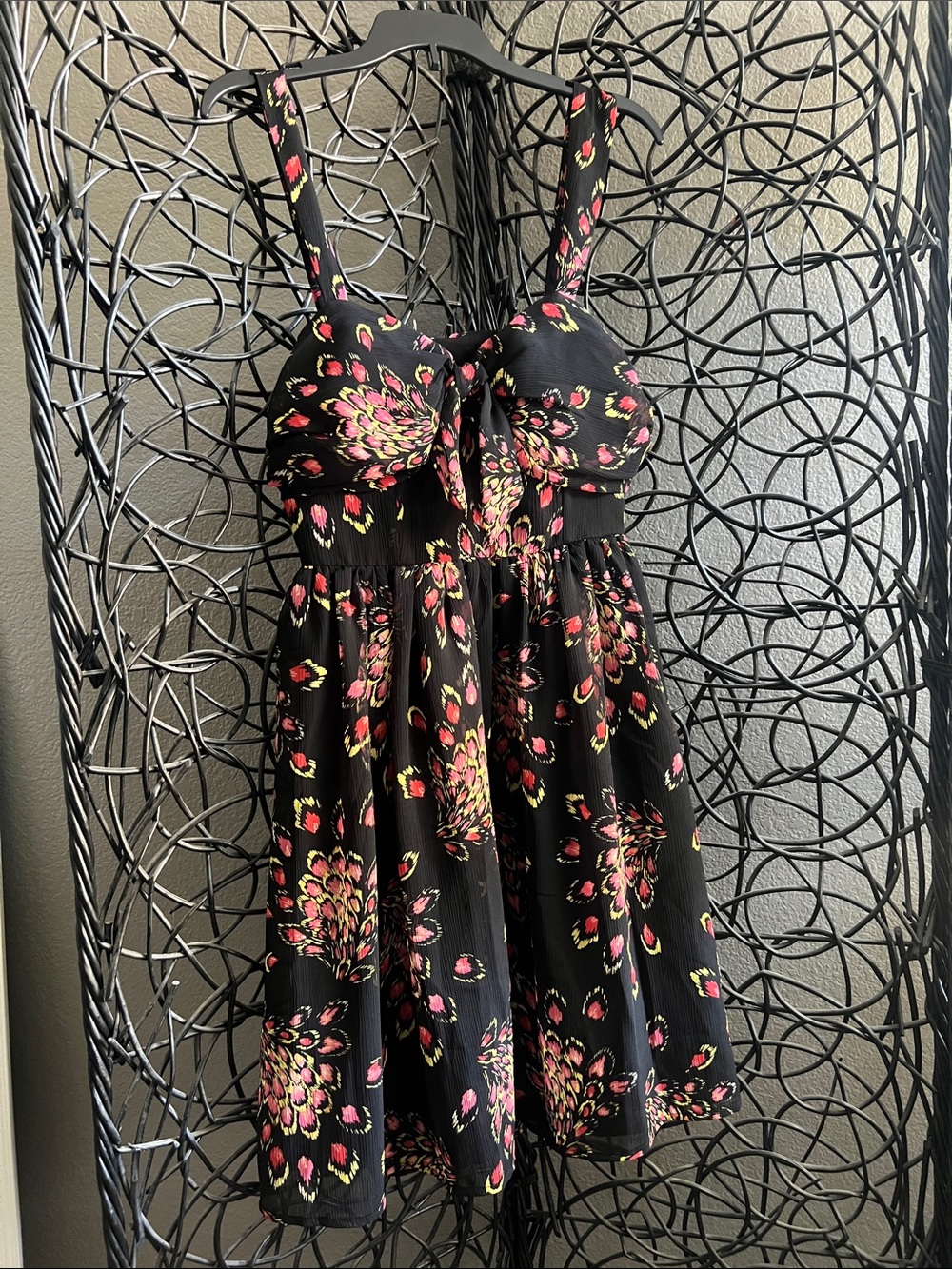 Black dress with peacock patter fabric